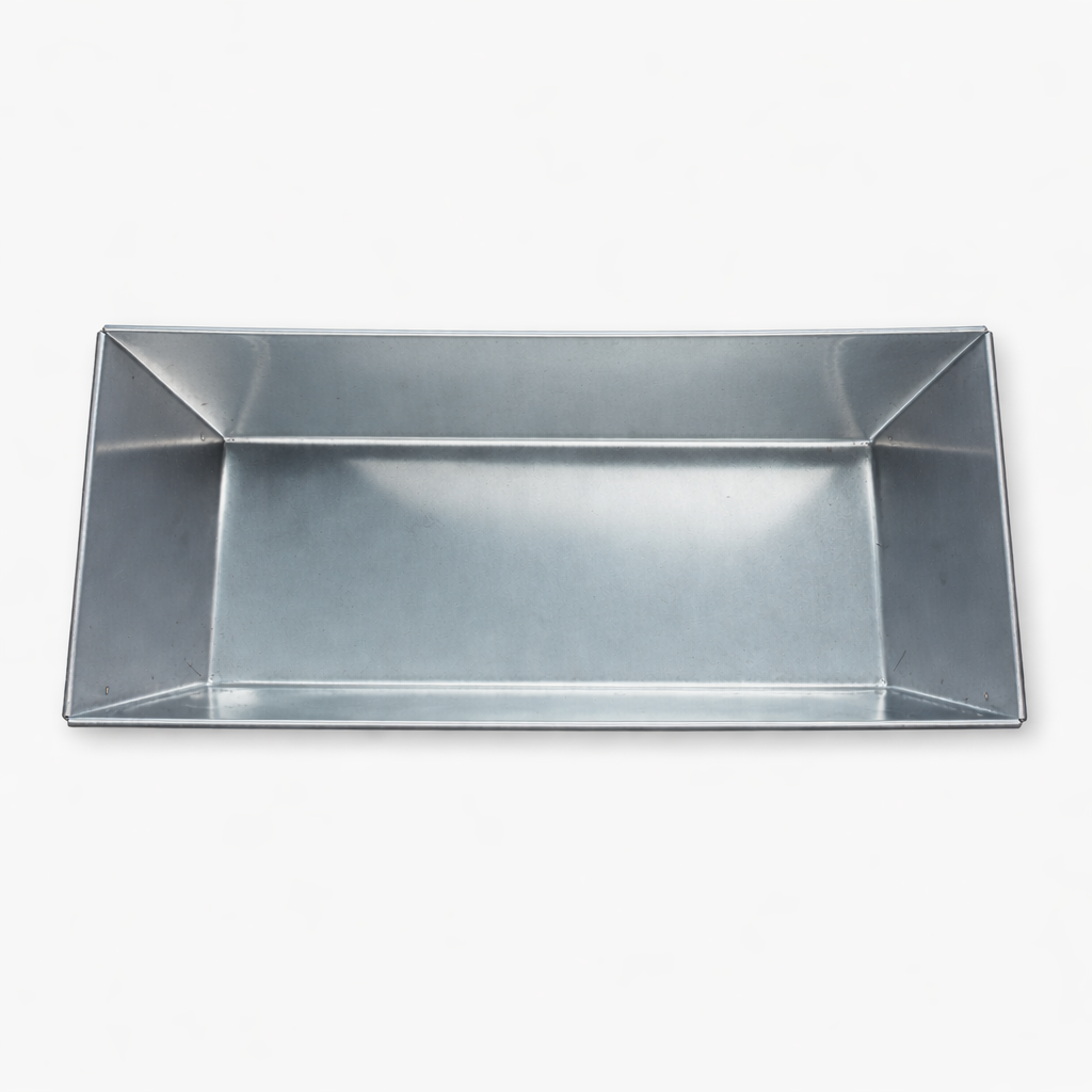 Top-down view of a deep stainless steel baking mold showing the large interior capacity. Perfect dimensions for meatloaf, casseroles, or large family-size breads. Seamless hygiene-friendly corners.