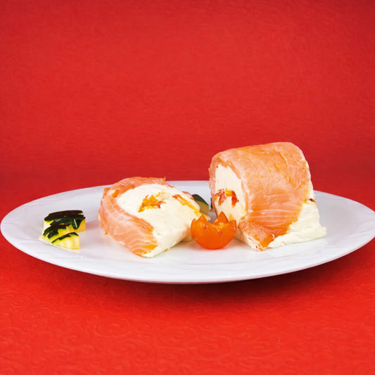 Gourmet salmon and cream cheese terrine slices with a rounded shape, achieved using a professional semicircle stainless steel terrine mold.