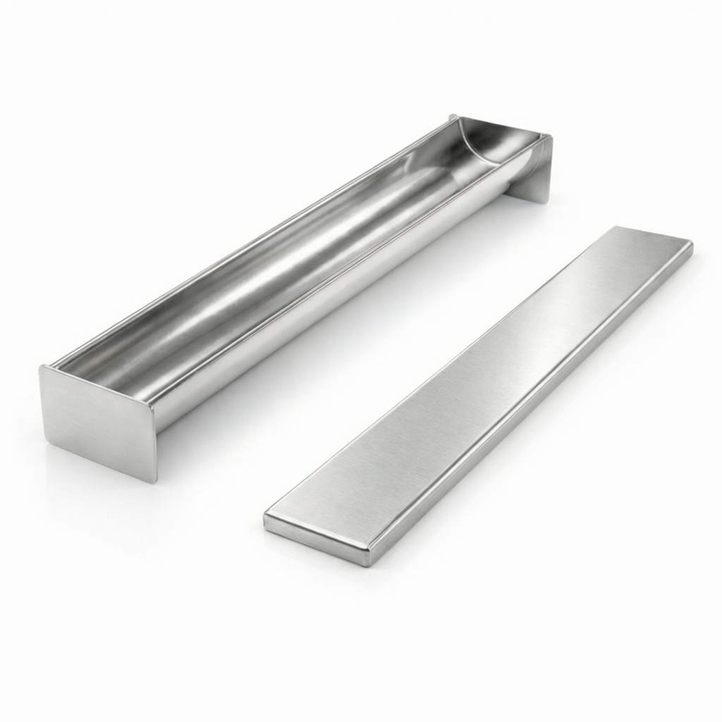 Open stainless steel half-round terrine mold showing smooth U-shape interior and separate flat press lid.