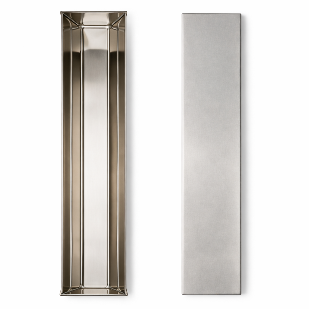 Top view of stainless steel trapezoid terrine mold body and separate flat lid. Shows angled interior profile for geometric pâté.