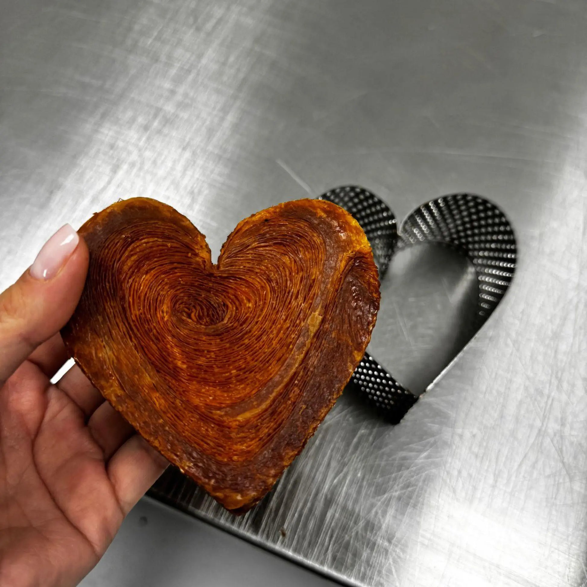Heart-shaped pastry made using perforated stainless steel pastry ring AISI 304