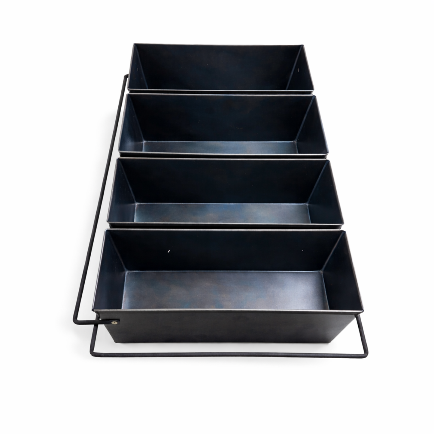 High-angle view of a commercial 4-strap black metal bread baking pan with deep compartments.