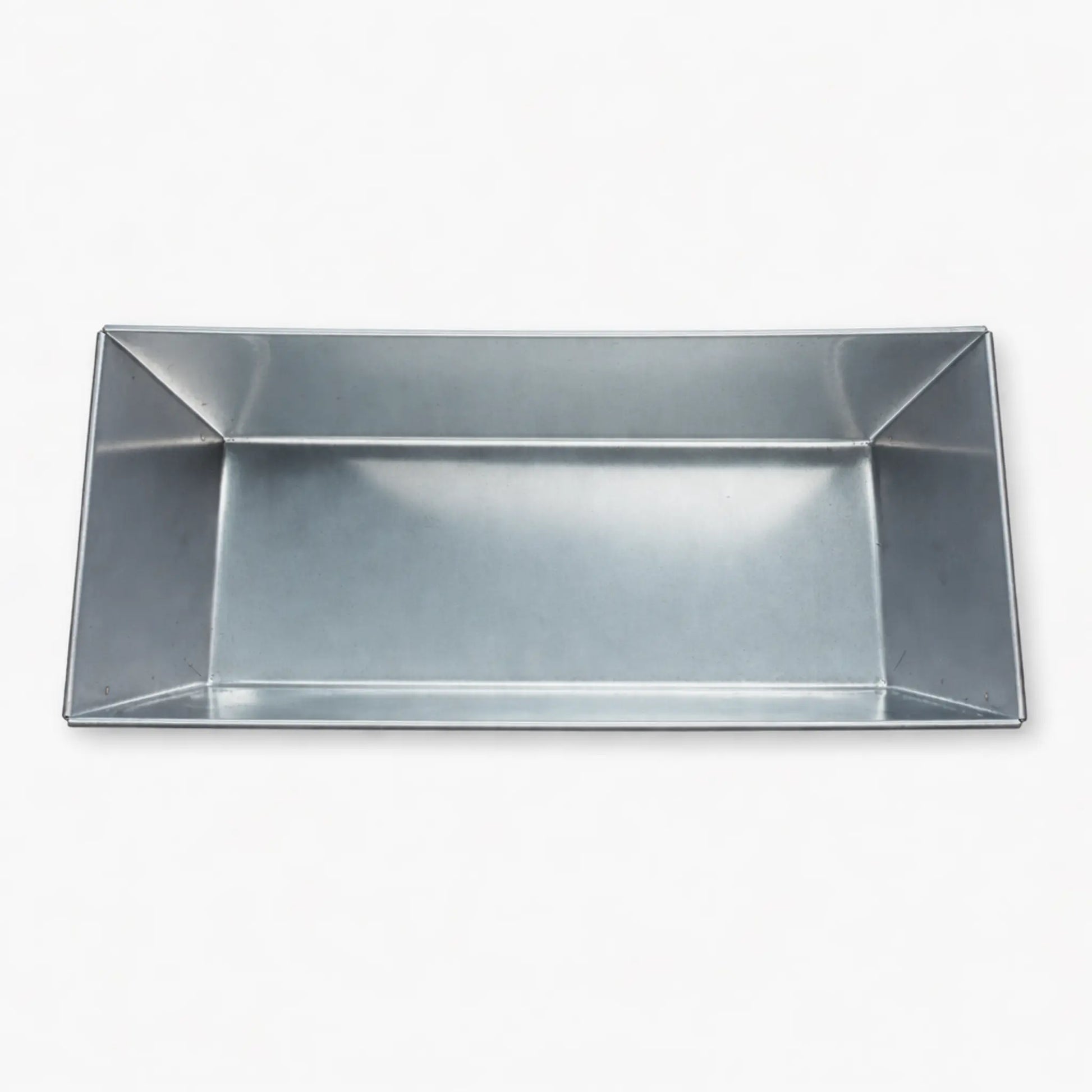 Top-down view of a deep stainless steel baking mold showing the large interior capacity. Perfect dimensions for meatloaf, casseroles, or large family-size breads. Seamless hygiene-friendly corners.
