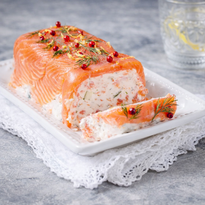 Elegant smoked salmon and cream cheese terrine with dill topping. Perfectly shaped in a professional stainless steel rectangular mold for festive seafood appetizers.