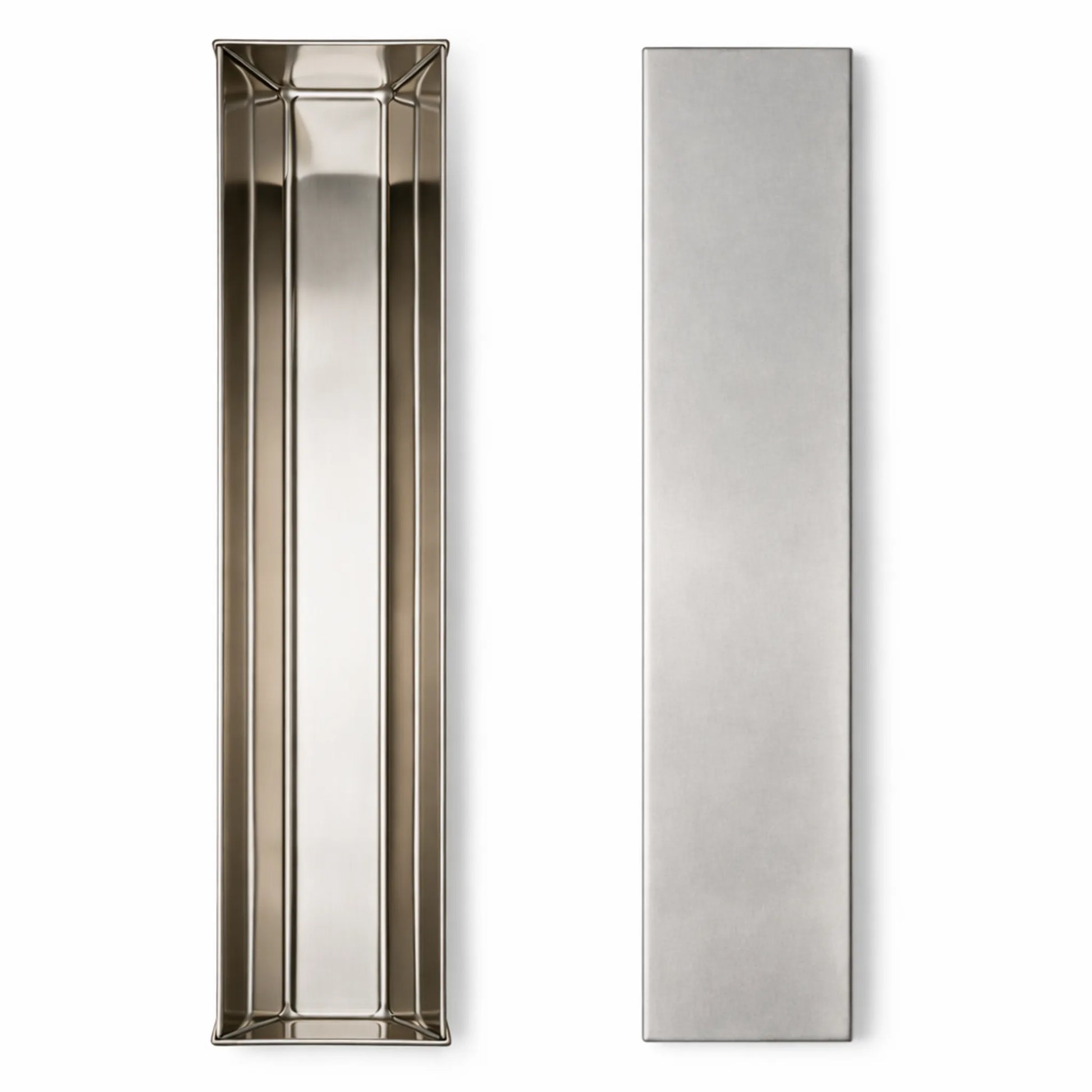 Top view of a professional trapezoid stainless steel terrine mold with its matching press lid, ideal for creating perfectly shaped pâtés and terrines.