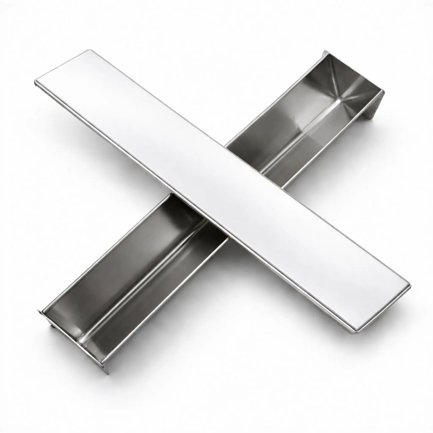 Professional stainless steel V-Shape terrine mold and its flat lid crossed on a white background, designed for making triangular pâté and desserts